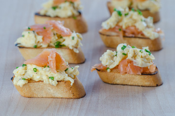 Toast with smoked salmon with scrambled eggs