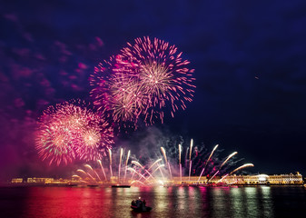 The fireworks and a laser show in the waters of the Neva River i