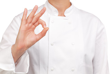 photograph of chef making hand sign all is well