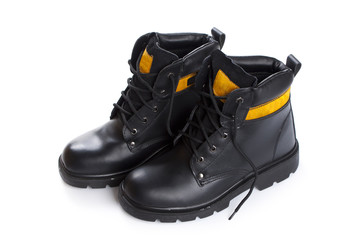 The high work black leather boots on white background