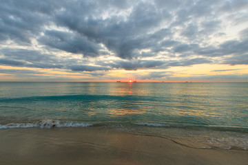 Color DSLR image of sunrise over the Atlantic Ocean, South Beach, Miami, Florida; horizontal with copy space for text