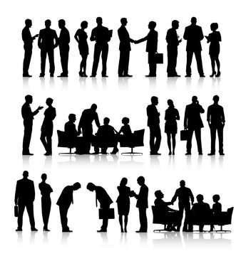 Rows Of Silhouettes Of Business People Working
