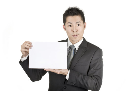asia business man hold a paper card