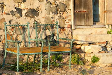 Two Green Chairs Outside an Abandoned Hut on Fort Amsterdam, Sin