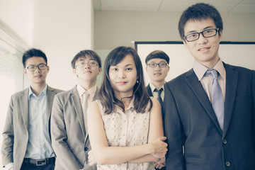 Group of business people with businessman leader on foreground