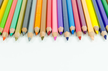 Colour pencils isolated on white background close up