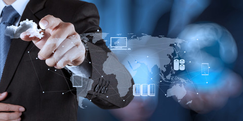Businessman working with a Cloud Computing diagram on the new co