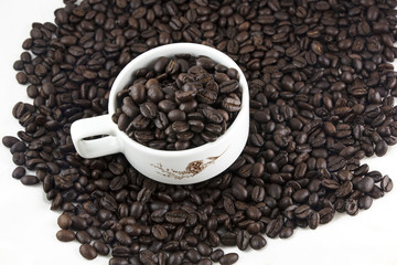 Coffee beans in cup