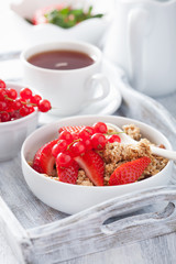 healthy breakfast with granola and strawberry