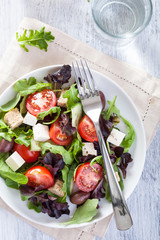healthy salad with tomatoes olives and feta cheese