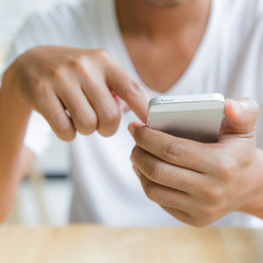 Man using smart phone