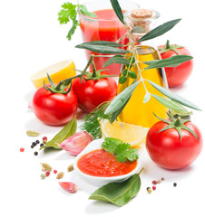 Obraz na płótnie Canvas Fresh vegetables and spices for preparation of tomato sauce