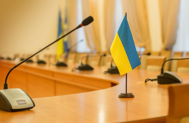 Flag of Ukraine on the negotiating table