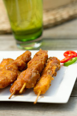 Satay chicken on skewers al fresco