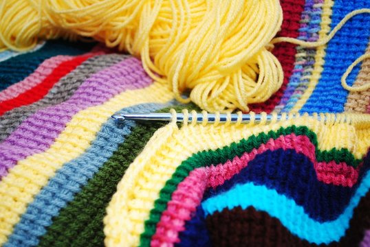 Chroceting a Colorful Striped Afghan