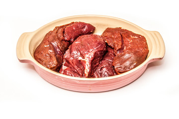 Kangaroo steaks isolated on a white background.