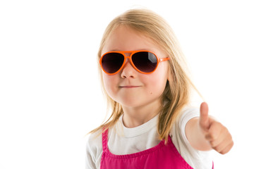 Little girl showing thumbs up