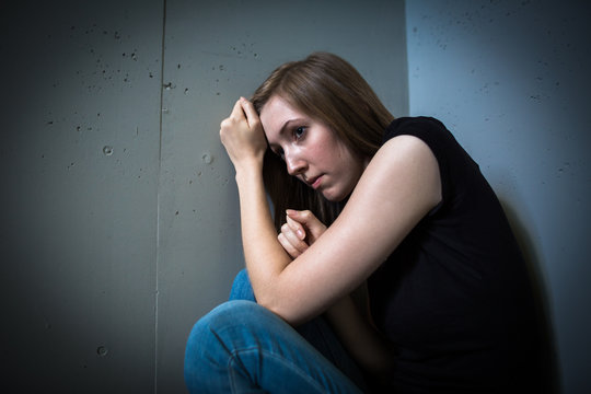 Young woman suffering from a severe depression