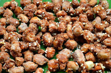 Coated nuts - peanuts, chocolate coated shocks.