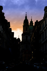 Obraz premium Prague spires in the sunset light, silhouette
