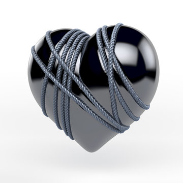 Schwarzes Latexherz in Bondage