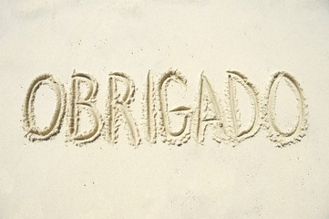 Obrigado Thank You Message in Sand