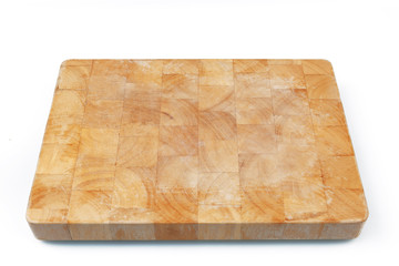 Wooden used cutting board on white background