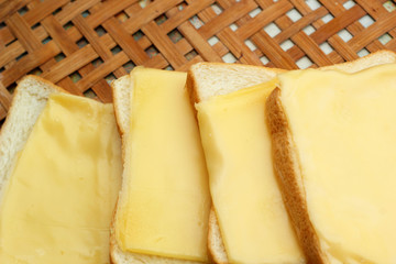 cheese the place on a slice of bread.