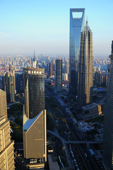 Naklejka premium Shanghai World Financial Center and Lijiazui road