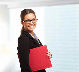 Businesswoman holding a clipboard