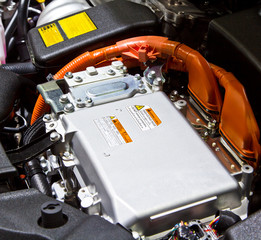Battery and hybrid engine