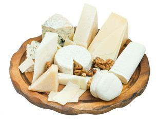 wooden plate with various cheeses © vvoe