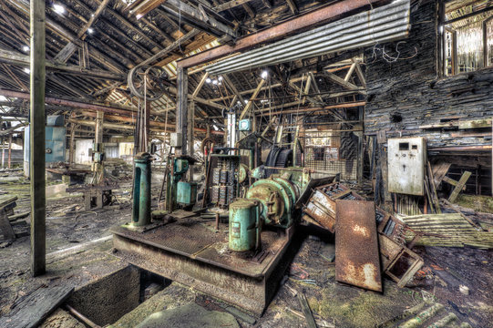 Old machinery in derelict workshop