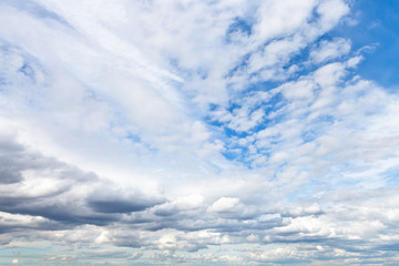 low cumuli clouds in blue sky