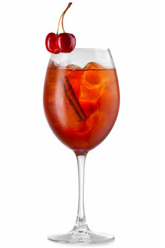 Orange alcohol cocktail with cherry berries isolated