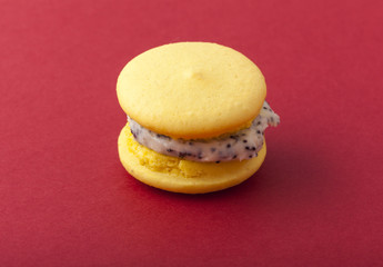 Sweet and colorful French macaroons on pastel background