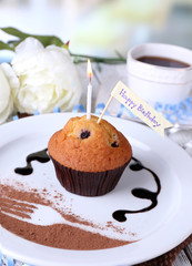 Blueberry muffin with chocolate sauce