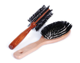 Wooden hairbrushes isolated on white