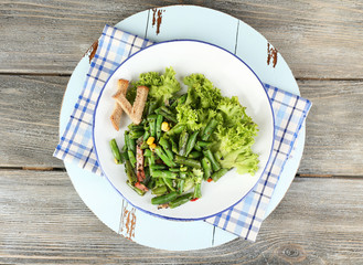 Salad with green beans, ham and  corn