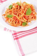 Pasta with tomato sauce on plate on table close-up