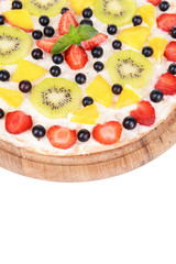 Sweet pizza with fruits close-up