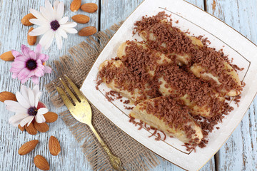 Sweetened fried banana on plate, close-up