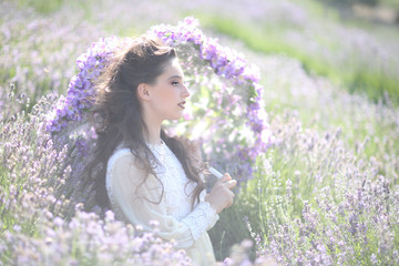 Pretty Young Girl Outdoors in a Lavender Flower Field