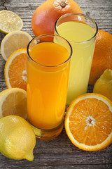 Orange juice and lemonade with orange, lemon and grapefruit