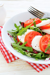 fresh Caprese salad with arugula