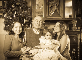 Obraz na płótnie Canvas old portrait of happy family in Christmas