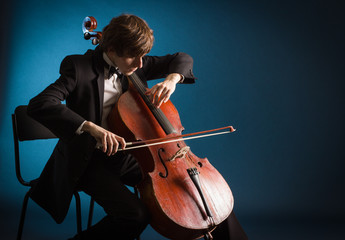 Cellist playing classical music on cello