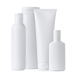 Blank white plastic cosmetics bottles, isolated