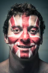 Happy man with British flag on face