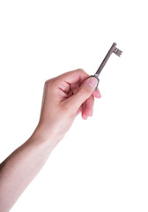 Female Hand Holding an Old Key on White Background